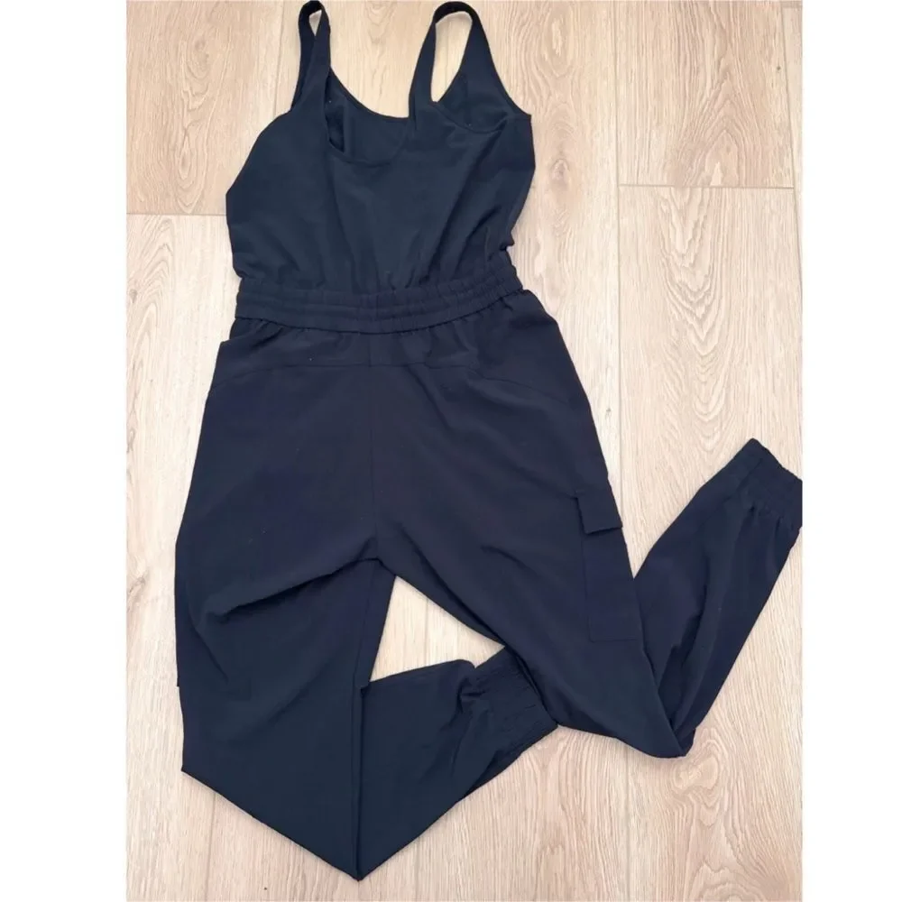 Athleta Size Medium Unbound Jumpsuit Black Travel Commute Lightweight Casual